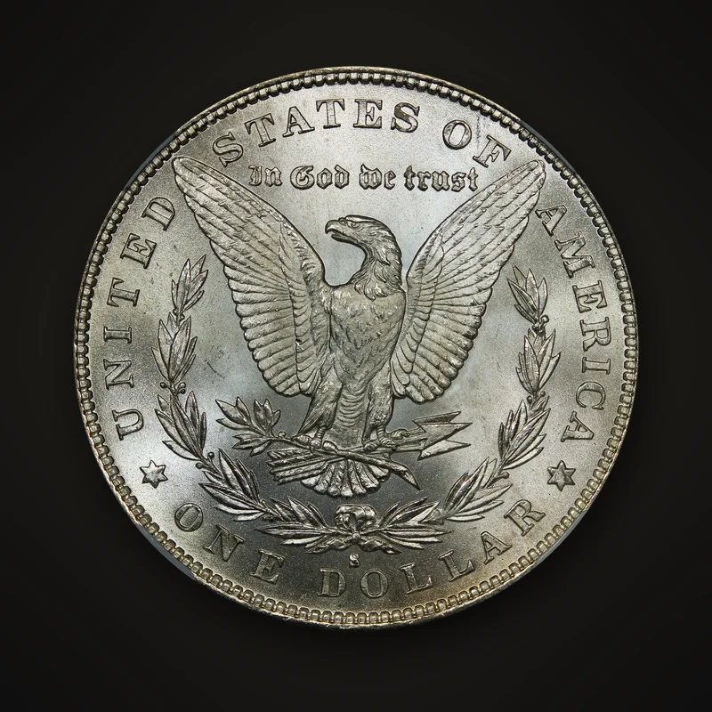 1879 Morgan Dollar, reverse: eagle with outspread wings within a laurel wreath, S mint mark