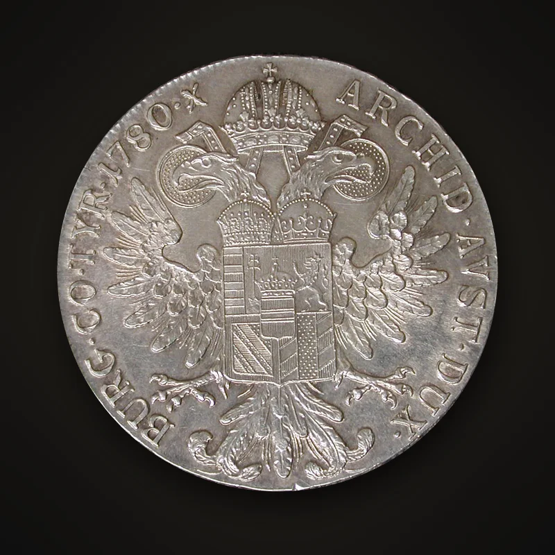 Maria-Theresien-Taler mit Jahreszahl 1780, Rückseite: gekrönter Doppeladler mit dem Habsburger Wappenschild